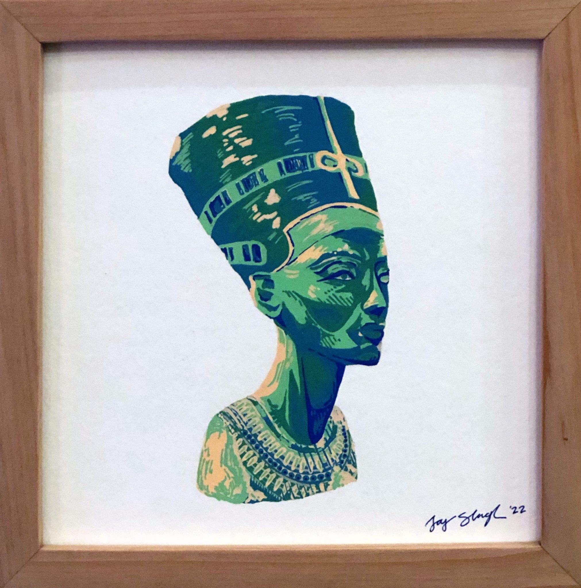 A painting of an Egyptian-styled bust in green and blue.